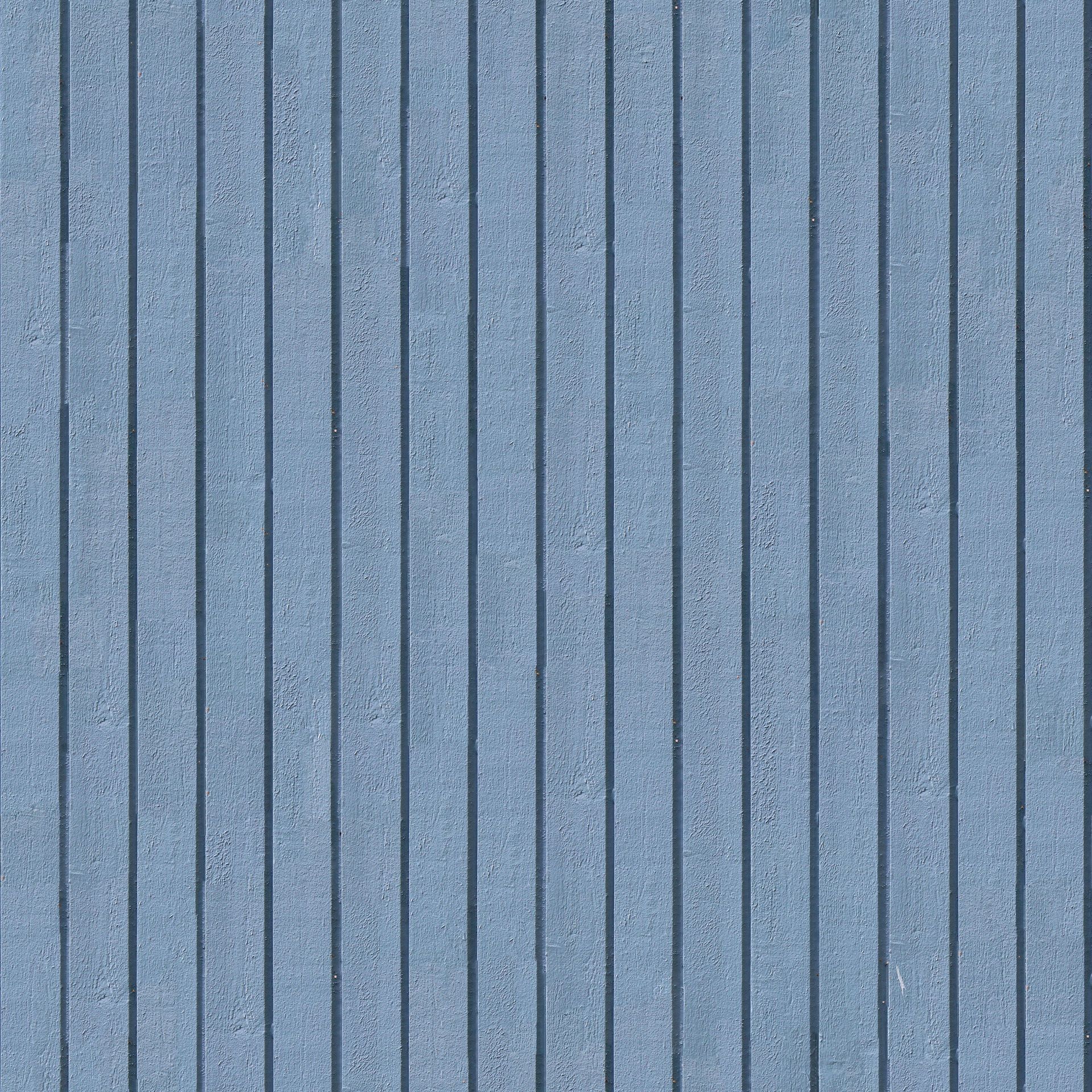 Vertical blue painted wooden plank wall with subtle texture.